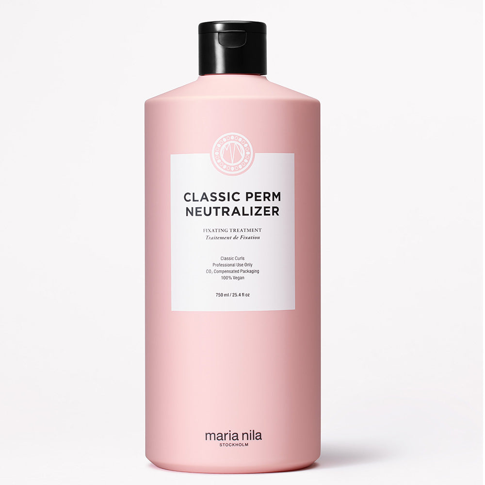 Pink bottle of Maria Nila Classic Perm Neutralizer on a white background